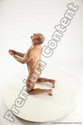 Nude Fighting with knife Man White Slim Short Brown Multi angles poses Realistic